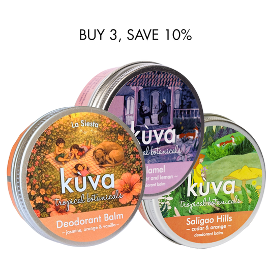 Three tins of Kùva deodorant balm in various scents: jasmine, orange, vanilla, cedar, and lemon.